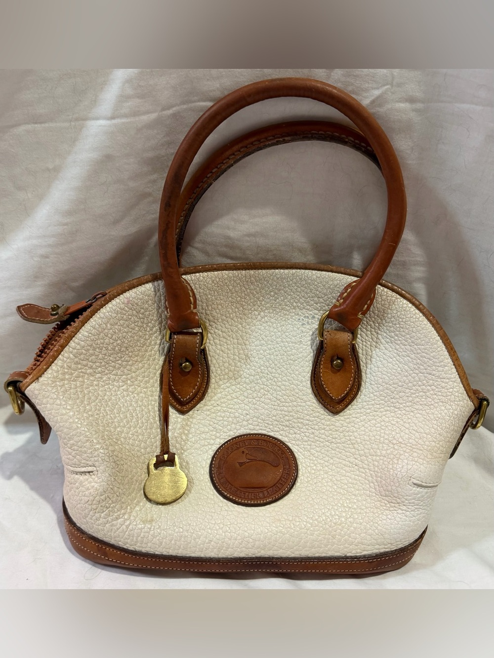 Dooney And Bourke Beige And English Tan Pebbled Leather Two Handled Satchel